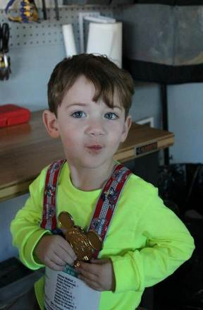 Gabriel with Mom's Disney Marathon Medal